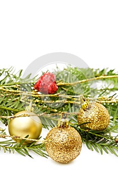 Christmas golden baubles and red heart