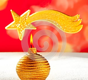 Christmas golden candle and bethlehem star