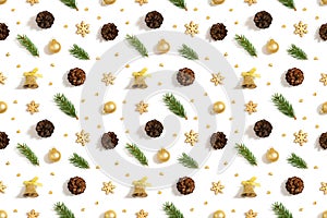 Christmas golden decor seamless pattern on white background. Fir branches, cones, bells and snowflakes. Winter concept. Top view,