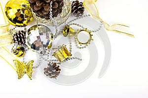 Christmas golden and silver decorations on white background. Basket weave on table top view
