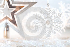 Christmas golden star and snowflake on a beautiful background. Christmas background.