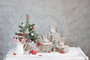 Christmas gray background with candles and tree