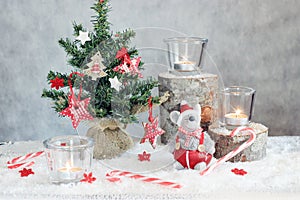 Christmas gray background with candles and tree