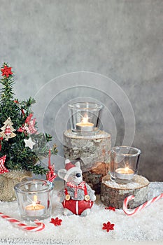 Christmas gray background with candles and tree