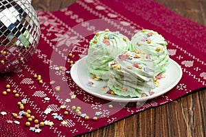 Christmas green mojito flavored marshmallow garnished with multicolored sugar sprinkles