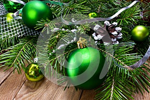 Christmas green ornament wreath on the wooden background, copy s