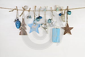 Christmas greeting card in blue, brown and white colors.