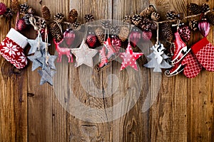 Christmas greeting card. Festive decoration on wooden background. New Year concept. Flat lay. Top view