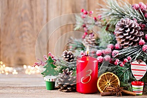 Christmas greeting card. Festive decoration on wooden background. New Year concept. Copy space.  Flat lay. Top view
