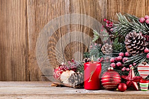 Christmas greeting card. Festive decoration on wooden background. New Year concept. Copy space.  Flat lay. Top view