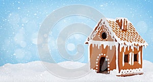 Christmas greeting card with gingerbread house