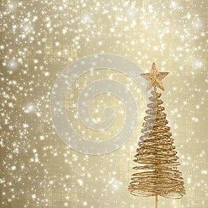 Christmas greeting card with gold metal firtree