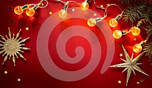 Christmas greeting card; holiday decoration on red background; flat lay ornament;  Xmas season banner