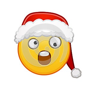 Christmas grinning face with one large and one small eye Large size of yellow emoji smile