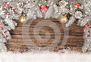 Christmas grunge wooden background with snow fir tree. View with copy space