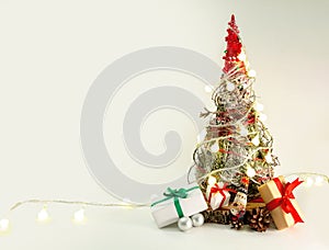 Christmas hand made fir isolated. Green red decoration banner craft paper red gift boxes lights garland. Recycle nature