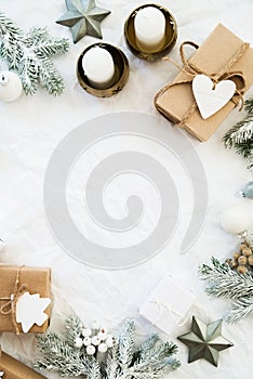 Christmas handmade gift boxes on white background top view. Merry Christmas greeting card, frame. Winter xmas holiday theme.