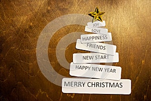 Christmas handmade tree. yellow star.retro style design, copy space.Minimalistic style for New Year. Design of cards