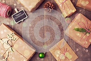 Christmas handmade wrapping gift boxes background. View from above