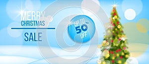 Christmas and happy New Year sale vector banner with snow, defocused decorated x-mas tree.