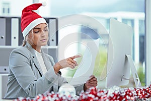 Christmas hat, business and woman with document, stress and reading with burnout, overworked and confused. Person