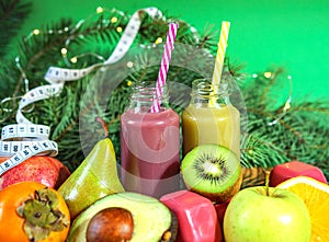 Christmas healthcare concept. Lifestyle fruits and vegetables. Keto diet food ingredient bottles smoothies acai berry measuring