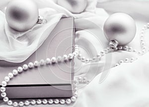 Christmas holiday background, festive baubles and silver vintage gift box as winter season present for luxury brand design