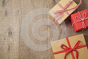 Christmas holiday background with gift boxs on wooden table