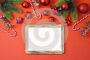 Christmas holiday background with photo frame, decorations and o