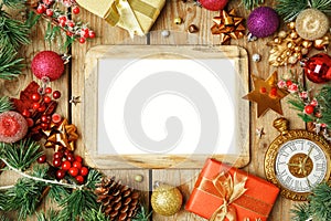 Christmas holiday background with photo frame, decorations and o