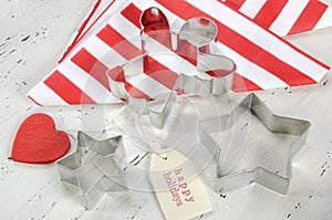 Christmas Holiday background with red and white theme cookie cutters - closeup