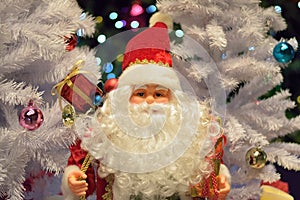 Christmas Holiday Background with Santa Claus & blurred LED lights