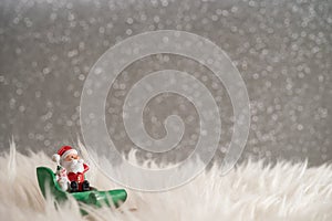 Christmas holiday background with Santa and decorations. Christmas landscape with gifts and snow. Merry christmas and happy new ye