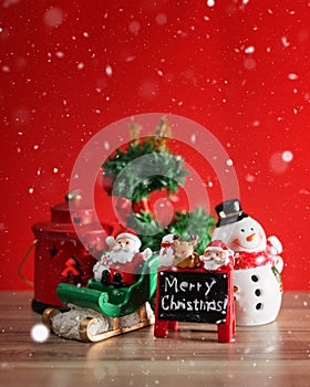 Christmas holiday background with Santa and decorations. Christmas landscape with gifts and snow. Merry christmas and happy new ye