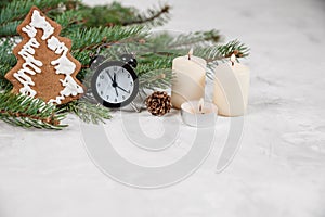 Christmas holiday background with vintage alarm-clock, Candy canes plastering background