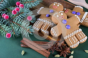 Christmas and holiday baking . Ginger men cookies with decor