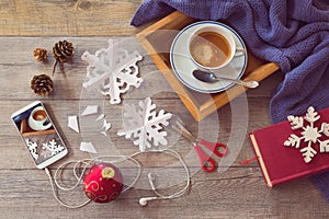 Christmas holiday celebration. Preparing paper snowflakes. View from above.