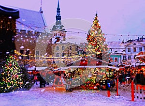 Christmas holiday in the city new year in Tallinn old town square Christmas tree decoration light market place Estonia