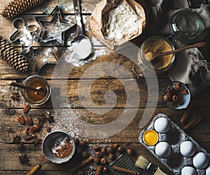 Christmas holiday cooking and baking ingredients on wooden background