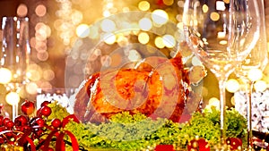 Christmas holiday family dinner. Decorated table with roasted turkey