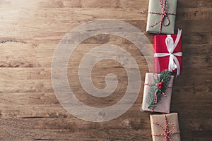 Christmas holiday gift boxes on wood table, border design background