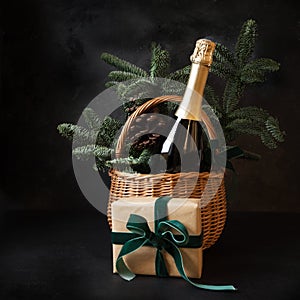 Christmas holiday gift hamper with sparkline wine and gift on black
