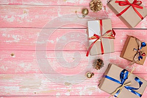 Christmas holiday gift shopping background. view from above with copy space. craft paper present boxes tied from rope on blue