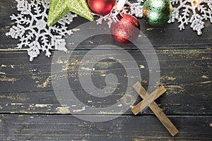 Christmas Holiday Ornaments and Christian Cross on a Dark Wood B