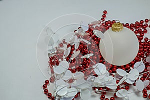 Christmas Holiday Ornaments of white opaque balls and colorful r