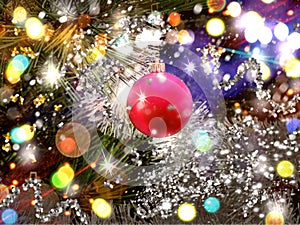 Christmas holiday  red  gold  silver  ball on green tree and  colorful confetti illumination blurred light holiday background gree