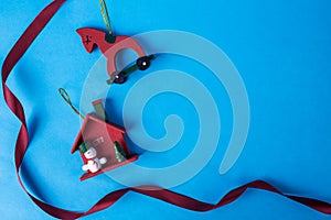 Christmas holiday theme with Christmas wooden toys. On a blue background