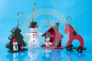 Christmas holiday theme with Christmas wooden toys. On a blue background