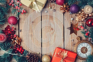 Christmas holiday wooden background with beautiful decorations and ornaments. View from above.