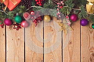 Christmas holiday wooden background with decorations and ornaments.